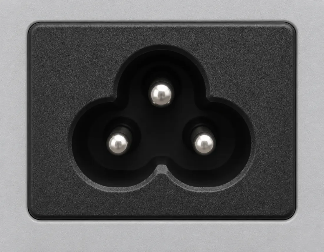 IEC 60320 C5 cord connector: fitted in place. Computer-generated illustration, not a photograph.