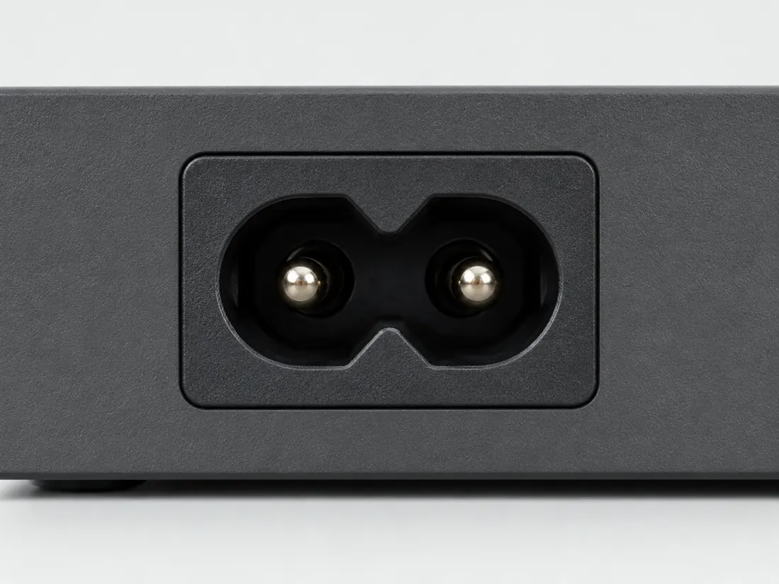 IEC 60320 C7 cord connector: fitted in place. Computer-generated illustration, not a photograph.