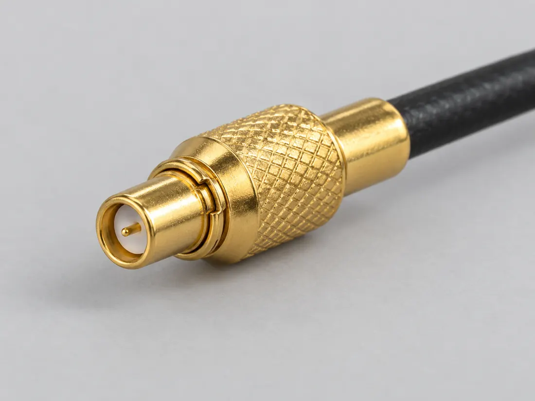 MMCX coaxial connector: three-quarter view. Computer-generated illustration, not a photograph.