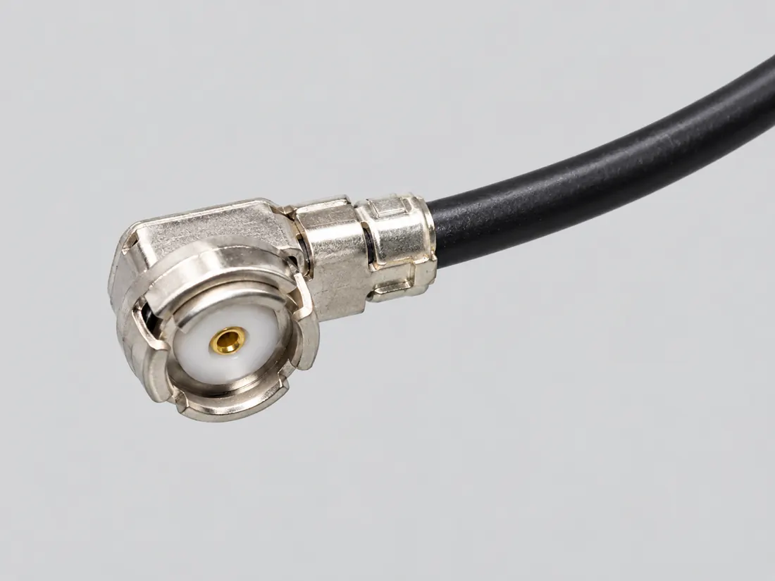 Hirose U.FL micro-coaxial RF connector: three-quarter view. Computer-generated illustration, not a photograph.