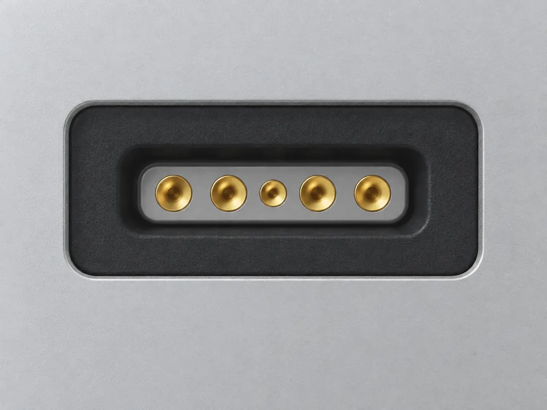 Apple original wired MagSafe — L-style and T-style: fitted in place. Computer-generated illustration, not a photograph.