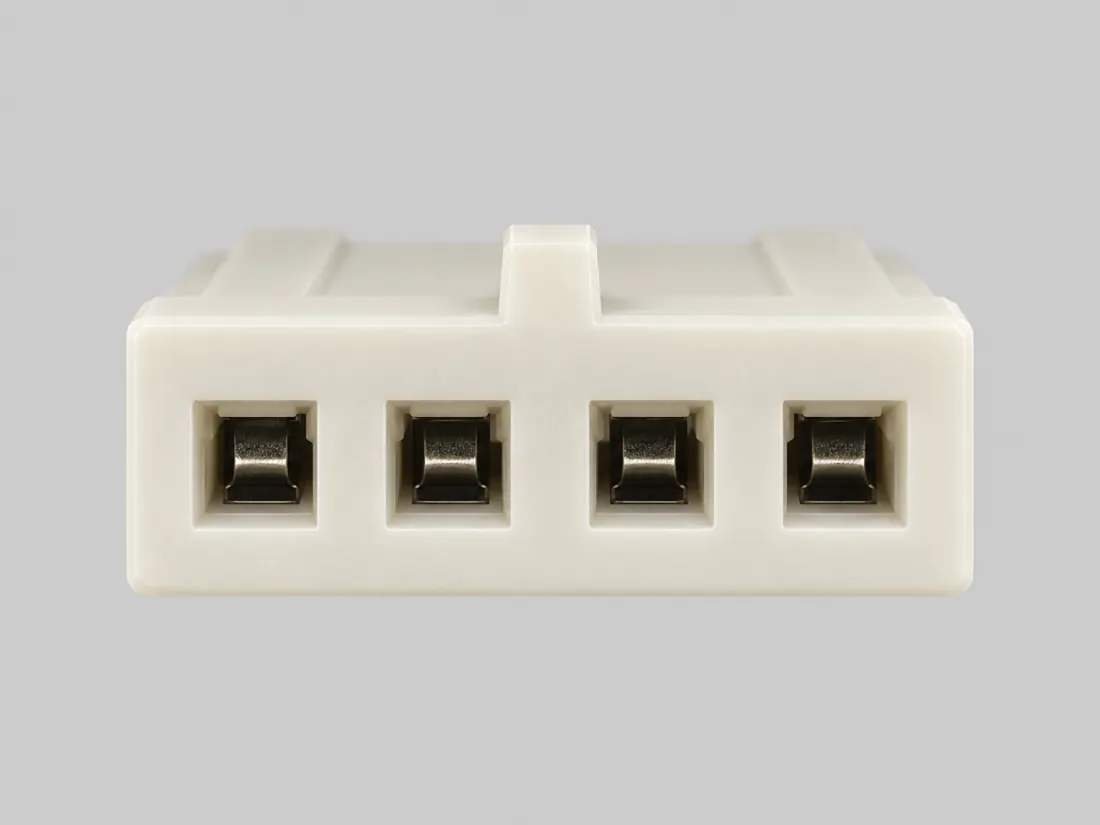 Miniature four-position floppy-drive power housing: mating face. Computer-generated illustration, not a photograph.